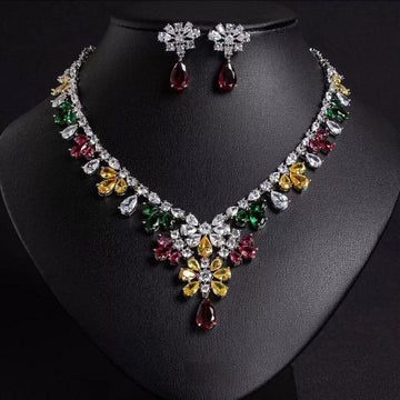 Multi color floral statement necklace and earring set with teardrop pendant and gold flower details - Fancydaria cubic zirconia necklace set