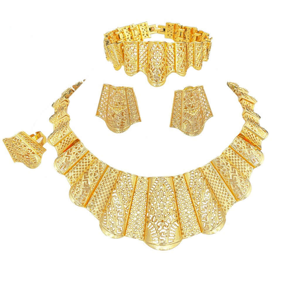 Gold jewelry set including necklace, bracelet, and earrings on a white background