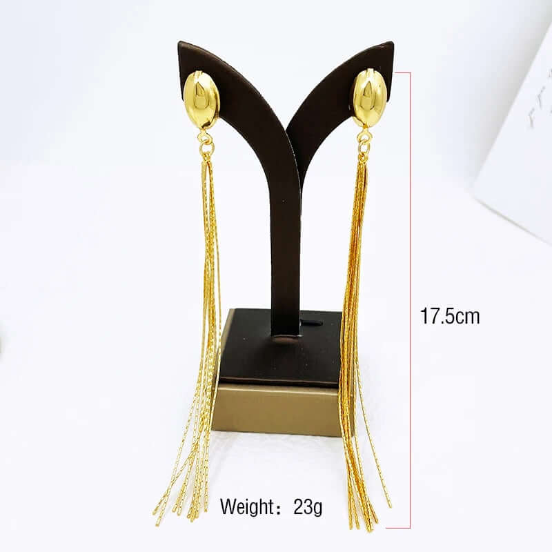 Golden Cascade Long Tassel Earrings – 18K Gold-Plated Statement Drop Earrings for Women | FancyDaria Jewelry on display