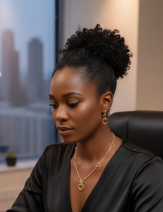 Woman with styled hair sitting in an office setting