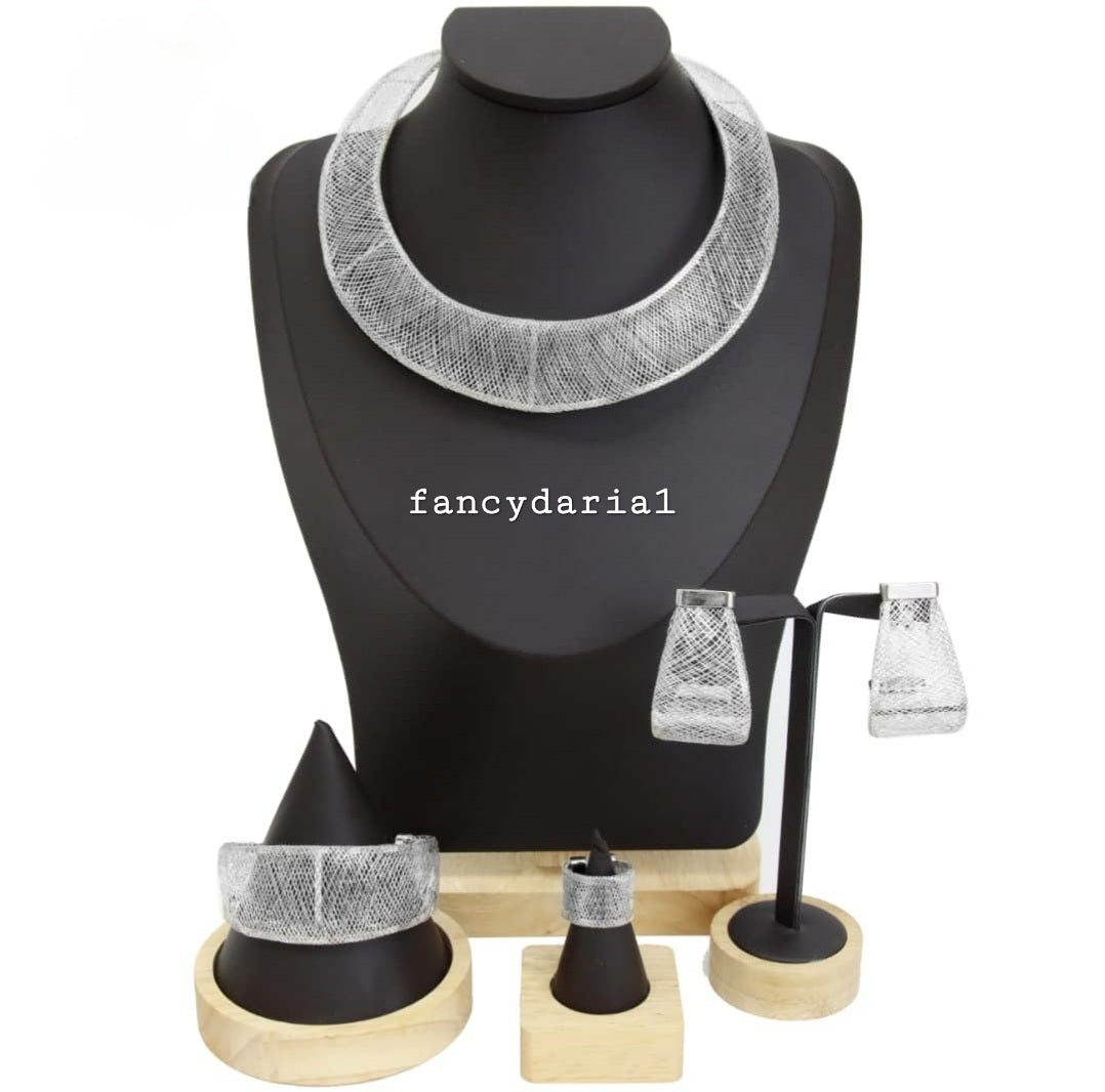 Jewelry set including necklace, earrings, and bracelets on a black mannequin and wooden stands with 'fancydarial' branding.