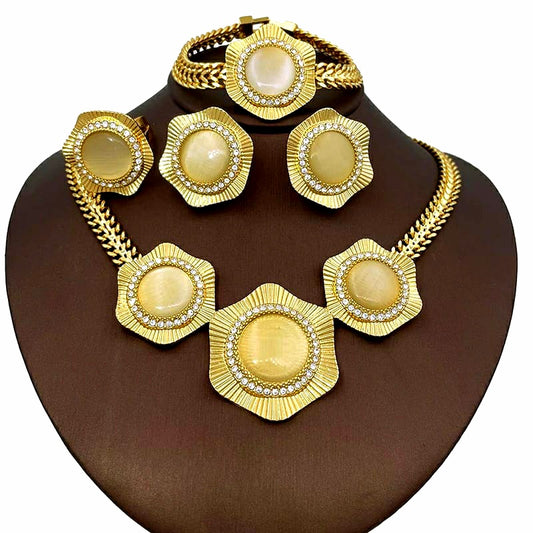 Kikiola Golden Jewelry Set – Elegant Gold Plated Necklace, Earrings, Bracelet & Ring for Women