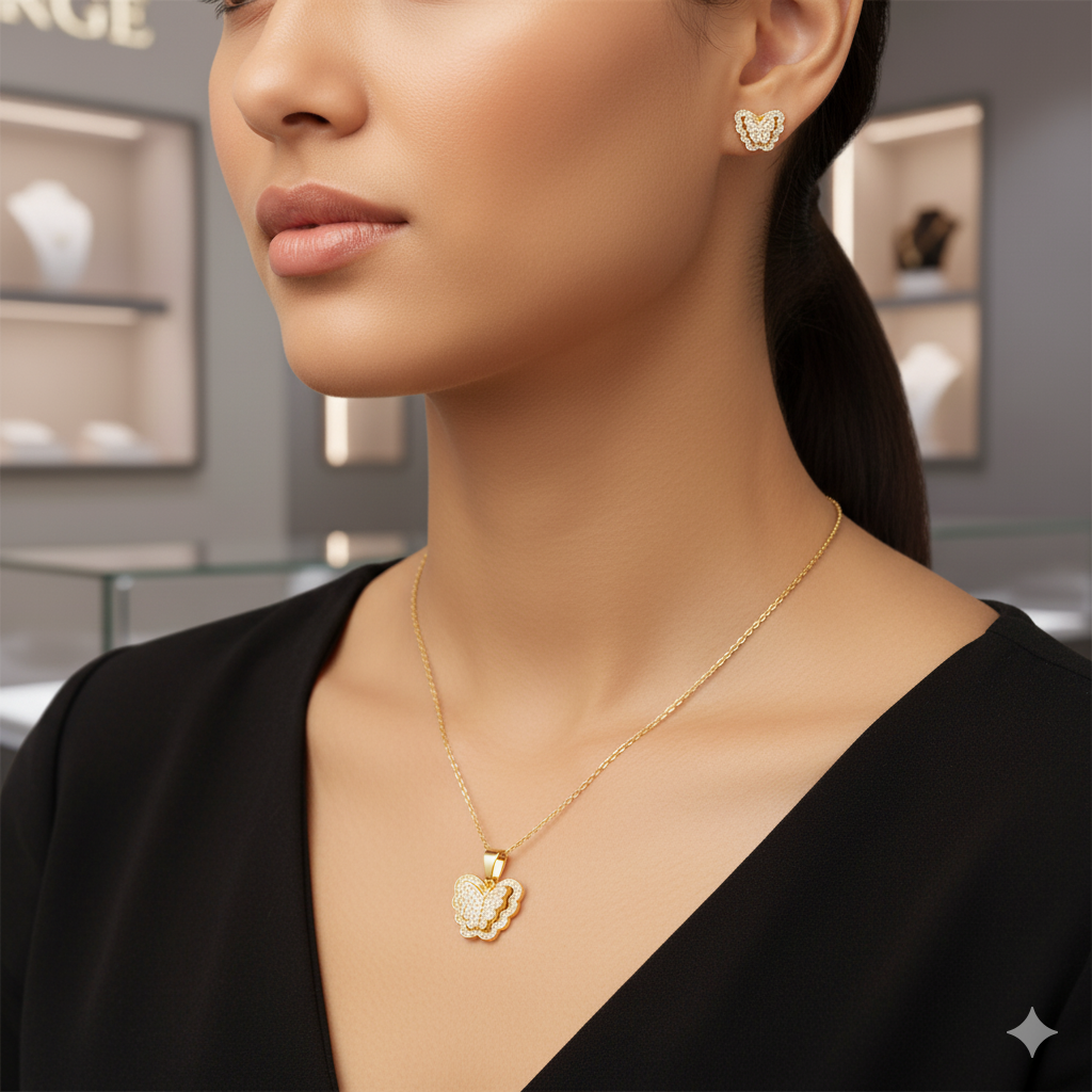 Woman wearing a gold necklace and earrings in a jewelry store setting