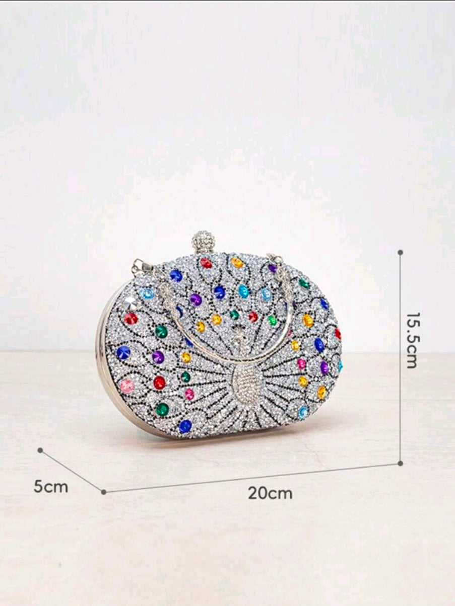 Colorful beaded clutch bag with measurements on a white background
