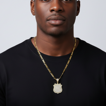 Man wearing a black shirt and gold chain with a pendant against a light gray background