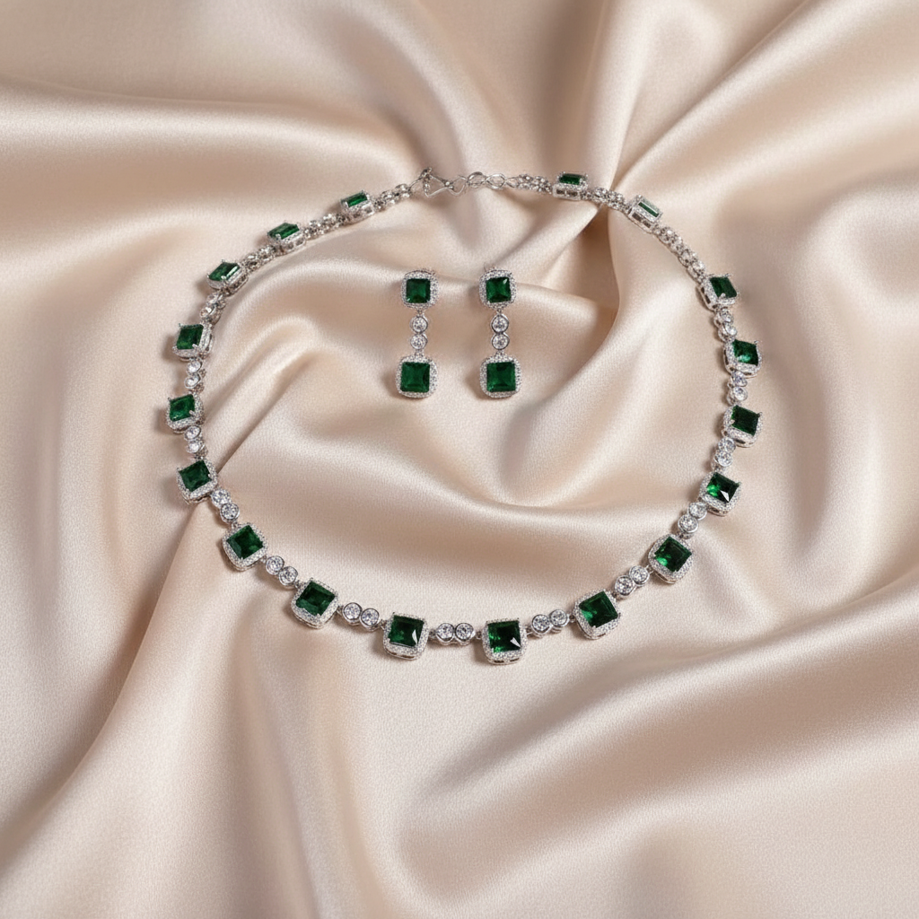 Jewelry set with necklace and earrings on a beige fabric background