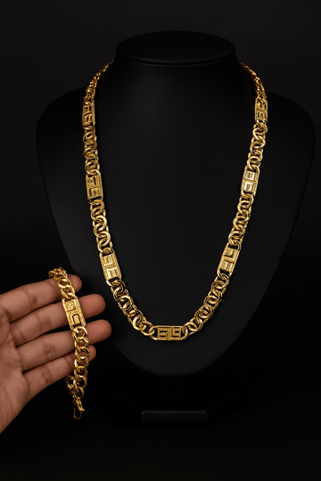 Prestige Unisex Cuban Gold Plated Necklace & Bracelet Set – FancyDaria displayed on a black bust with a hand holding the bracelet.