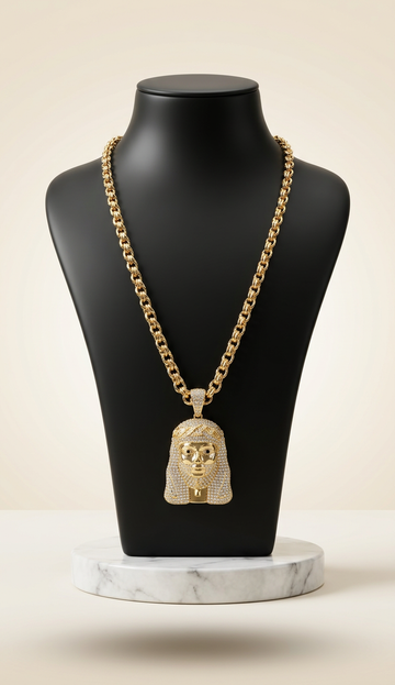 Gold-plated iced out pharaoh pendant necklace on black bust with marble base – Fancy Daria men's jewelry